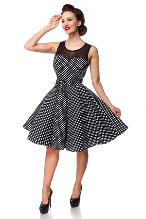 Women's black dress with white polka dots fitted bodice round neckline wide straps sleeveless mesh top decently covers the