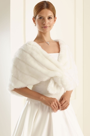 Warm quilted wedding bolero - cape monochrome light ivory color V-neck without sleeves lobes on the front part can be secured