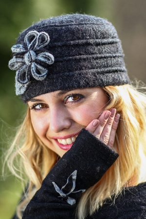 Women's stylish toka hat from double layer stripes around the perimeter distinctive fabric flower on the side from boiled
