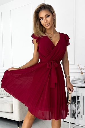Dress with pleated skirt Ribbons instead of sleeves crossover front at neckline deep V-neckline elasticated elastic at waist