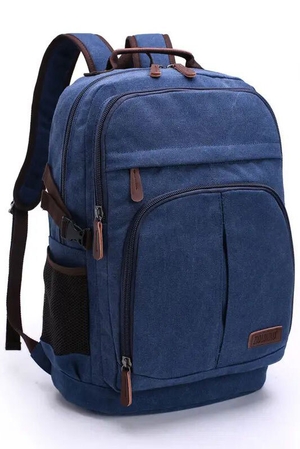 Large student backpack: in a modern canvas design with leather details two large main zipped pockets laptop compartment