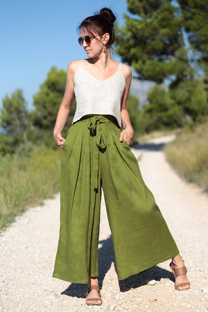 Women's linen trousers with wide legs sewn and designed in the Czech Podkrkonoší region with pockets stretched elastic at