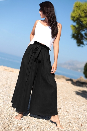 Women's linen trousers with wide legs sewn and designed in the Czech Podkrkonoší region with pockets stretched elastic at